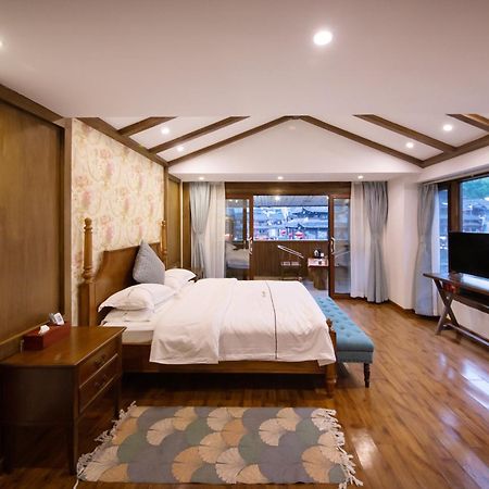 Fenghuang Slowly Time Inn Esterno foto