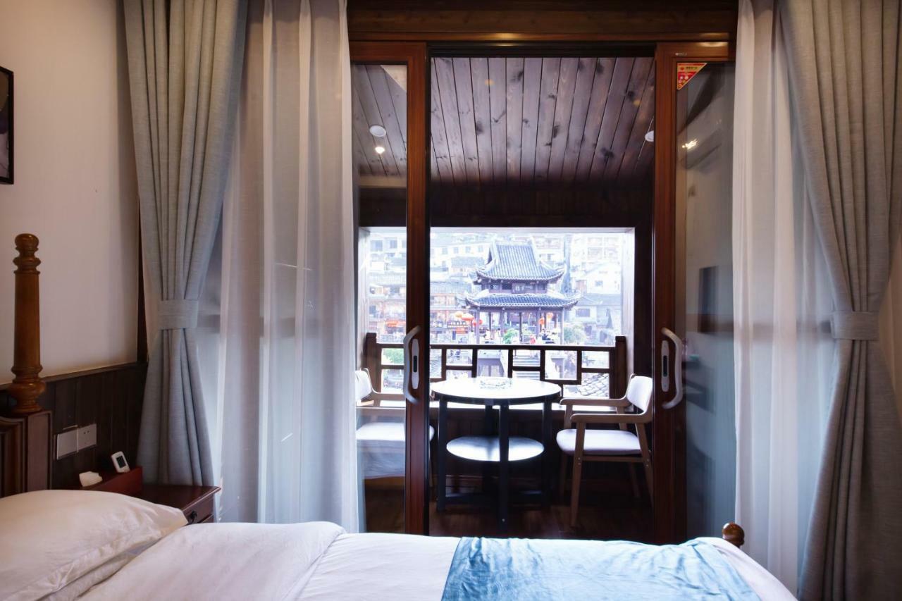 Fenghuang Slowly Time Inn Esterno foto