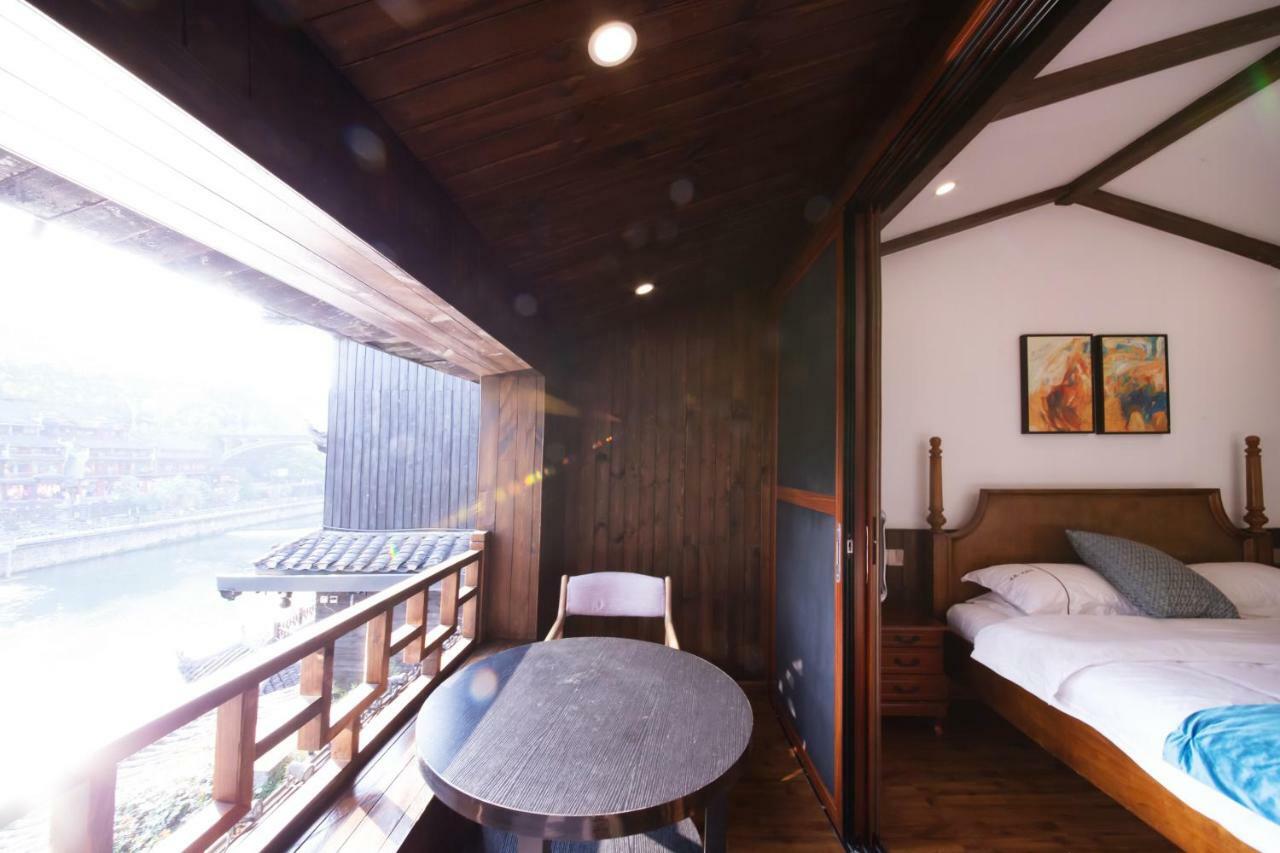 Fenghuang Slowly Time Inn Esterno foto